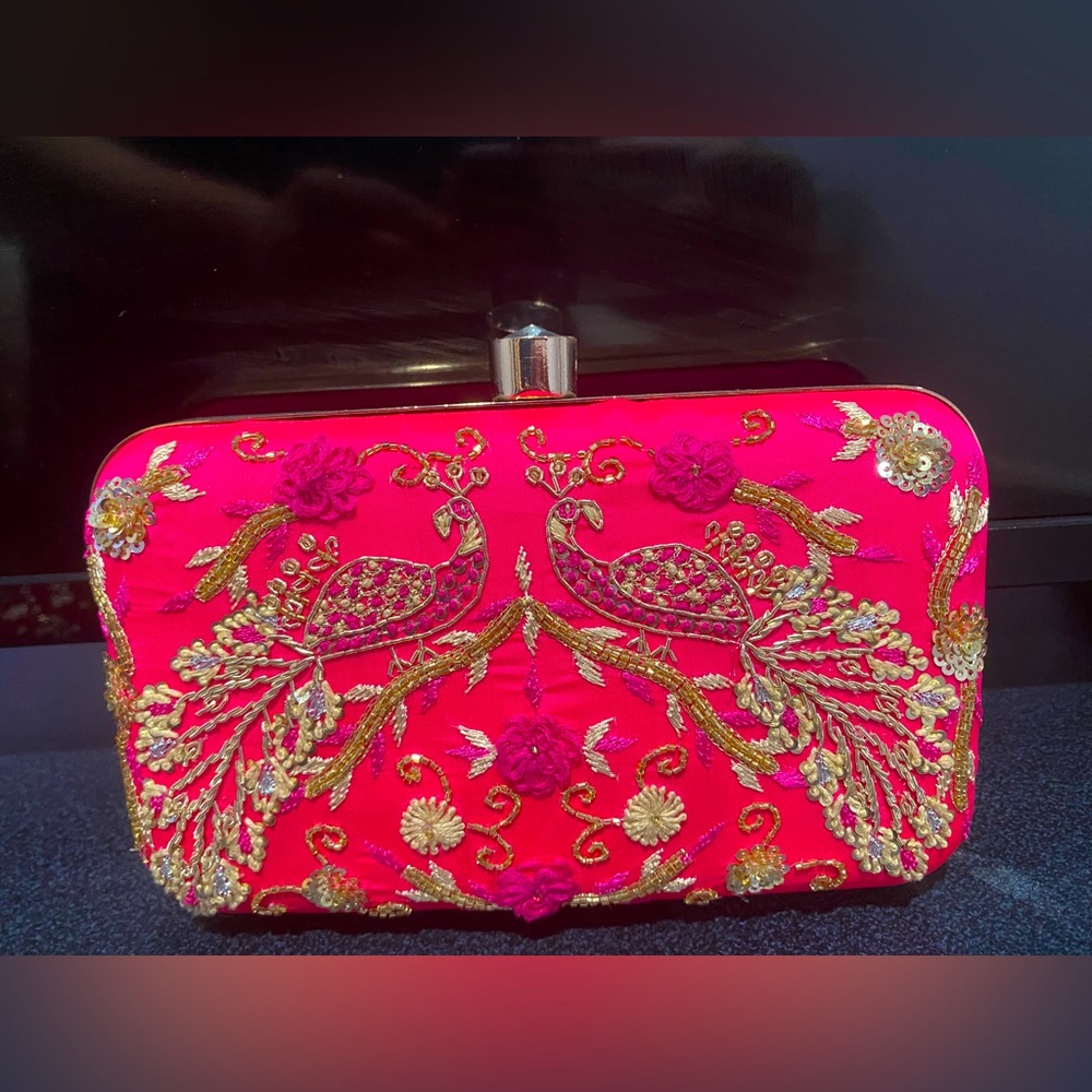 Nice pink clutch string also inside
